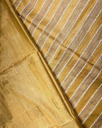 Golden Bhagalpuri Silk Saree – White Stitch-Line Detailing